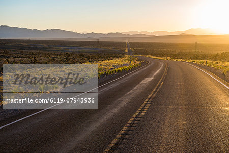Long winding road at sunset in eastern Nevada, United States of America, North America