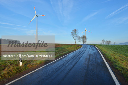 Country Road in Morning with Wind Turbines, Freiensteinau, Vogelsbergkreis, Hesse, Germany