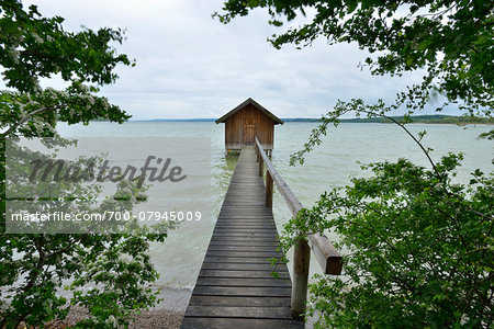 Boathouse with Wooden Jetty on Lake, Ammersee, Stegen am Ammersee, Funfseenland, Upper Bavaria, Bavaria, Germany