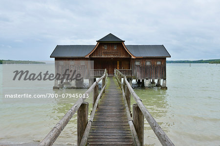 Boathouse with Wooden Jetty on Lake, Ammersee, Stegen am Ammersee, Funfseenland, Upper Bavaria, Bavaria, Germany