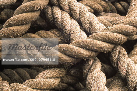 Close-up of rope used for a tug boat towline, coiled on deck, USA Close-up of rope used for a tug boat towline, coiled on deck, USA