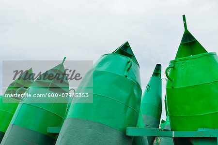 Close-up of Waterway Markers and Buoys in Harbor, Norderney, East Frisia Island, North Sea, Lower Saxony, Germany Close-up of Waterway Markers and Buoys in Harbor, Norderney, East Frisia Island, North Sea, Lower Saxony, Germany