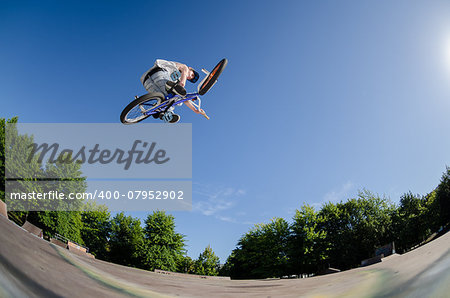 High BMX jump in a skate park.