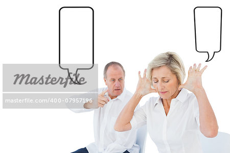 Older couple sitting in chairs arguing against speech bubble