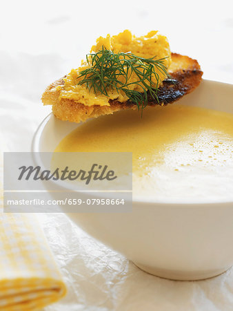 Cream of sweetcorn soup with a scrambled egg crostino