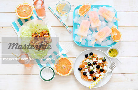 A summer buffet featuring grapefruit dishes and drinks A summer buffet featuring grapefruit dishes and drinks