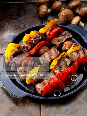 Group skewers with mushrooms and peppers