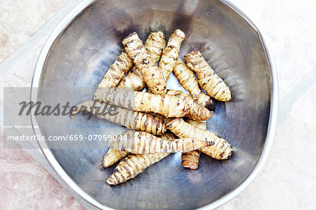 A bowl of Jerusalem artichokes A bowl of Jerusalem artichokes