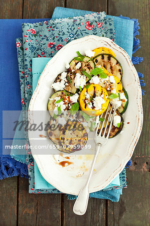 Grilled courgettes with feta, mint and a balsamic dressing Grilled courgettes with feta, mint and a balsamic dressing