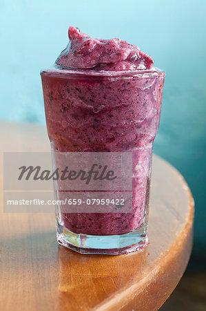 A blueberry and banana smoothie with apple juice A blueberry and banana smoothie with apple juice