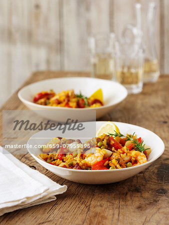 Seafood paella with lemon and rosemary
