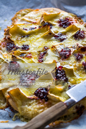 Pizza with brie, mozzarella and cranberries