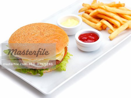 still life with fast food hamburger menu, french fries, soft drink and ketchup