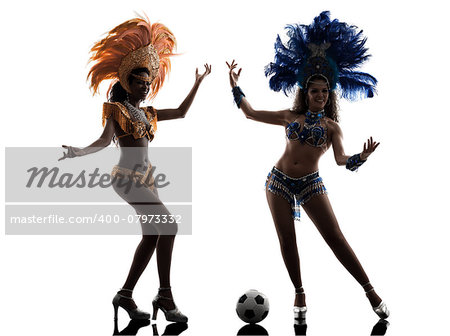 two women samba dancer playing soccer silhouette on white background