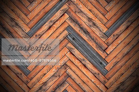 weathered texture of wood floor forming mounted parquet design