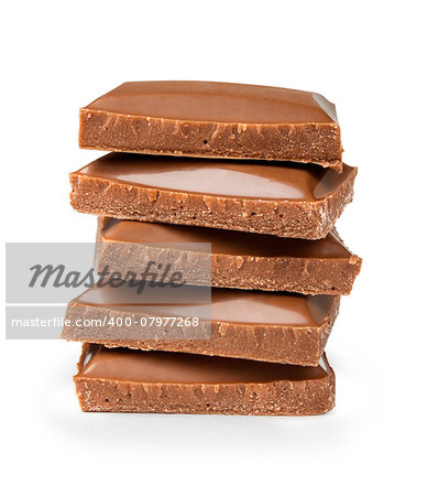stack of pieces of milk chocolate on a white background
