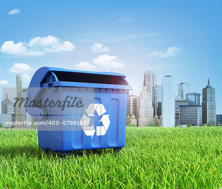 Green plastic trash recycling container ecology concept, with landscape background.