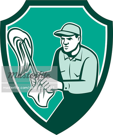 Illustration of a janitor cleaner worker standing holding mop and cleaning cloth wipes set inside shield crest on isolated background done in retro style.