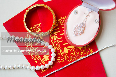 Close-up of Bridal Jewelry and Ang Pow, Studio Shot Close-up of Bridal Jewelry and Ang Pow, Studio Shot