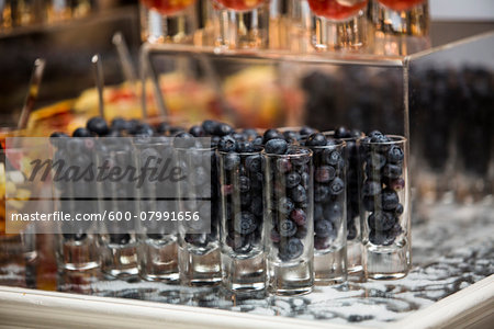Close-up of Blueberries in Shot Glasses on Dessert Table