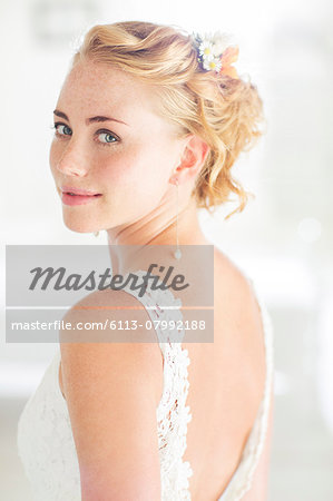 Portrait of bride in domestic room