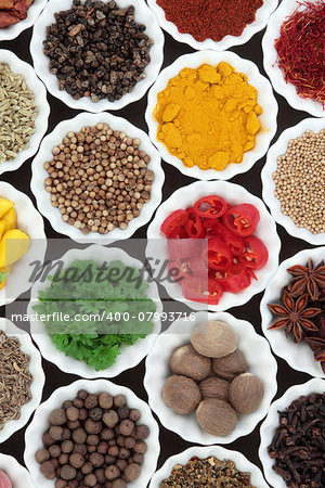 Spice and herb selection in porcelain crinkle bowls.