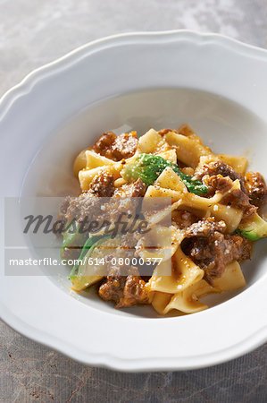 Bowl of with pasta with minced meat and vegetables