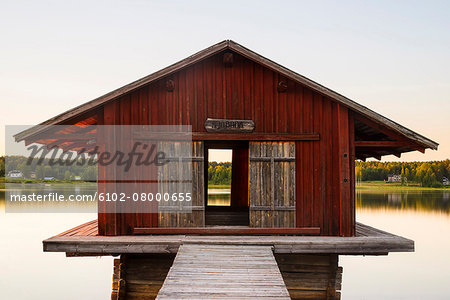 Wooden building at lake
