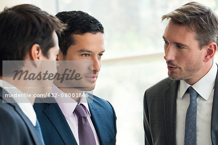 Businessmen talking together