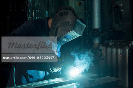Welder soldering iron in workshop