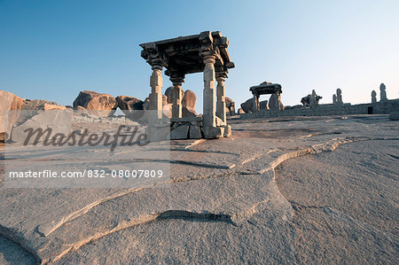 Religious marble and stone structures built on rock slabs; Hampi, Karnataka, India