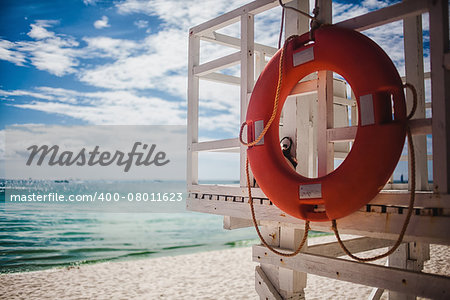 Lifebuoy on the beach, a tropical coastline