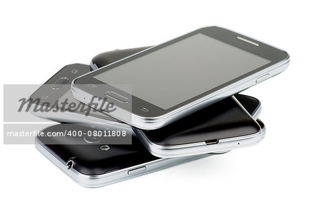 Pile of Four Black Smartphones with Silver Details and Buttons isolated on white background