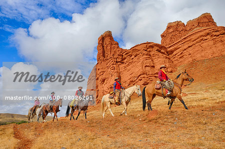 Cowboys and Cowgirls Riding Horses, Wyoming, USA