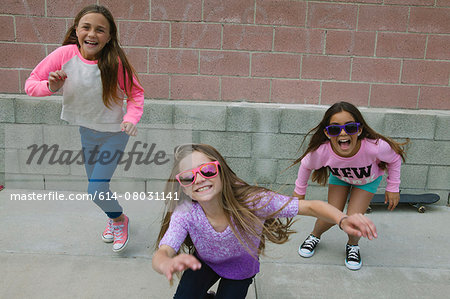 Three girls running