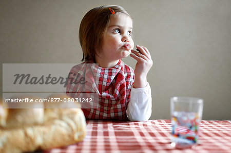 A girl having a snack