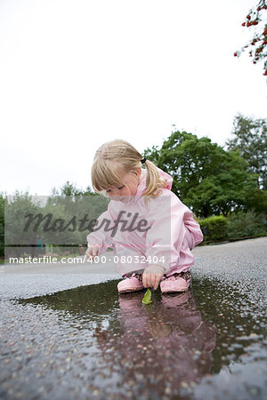 Baby Girl in a pool of water