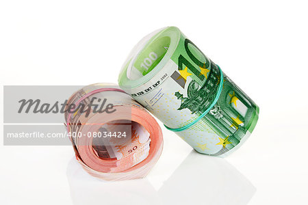 Money rolls. Fifty and hundred euro banknotes in rolls isolated on white background.