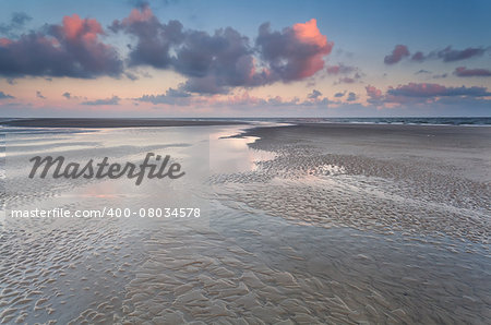 low tide on North sea during sunrise, Holland
