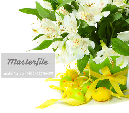 Bouquet of alstroemeria flowers with Easter eggs on white background