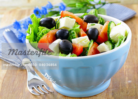 Greek salad with olives cheese and tomatoes