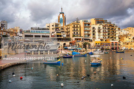 MALTA - JANUARY 23: Spinola Bay and Portomaso Tower in Saint Julian, Malta on January 23, 2015. Portomaso Business Tower is the tallest building in Malta. Opened in 2001, the Tower is 98 metres (322 ft) tall, with 23 floors of mixed commercial office space.