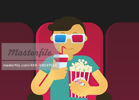 Young guy is watching 3D film in the cinema.