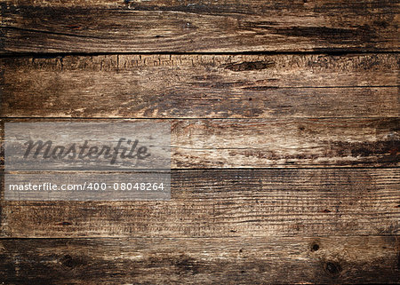Old natural wooden board. May be used as background