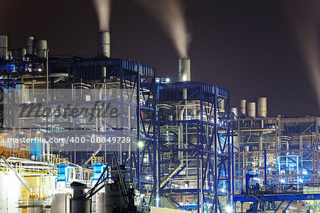 power station at night with smoke, hong kong