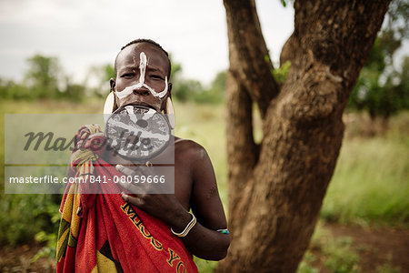 Portrait of Dinakari, Mursi Tribe, Minisha Village, Omo Valley, Ethiopia, Africa