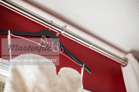Close-up of Bride's Wedding Gown on Hanger