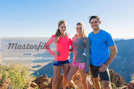 Portrait of three trail running friends on Pacific Crest Trail, Pine Valley, California, USA