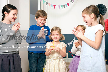 Children on birthday party having fun, Munich, Bavaria, Germany
