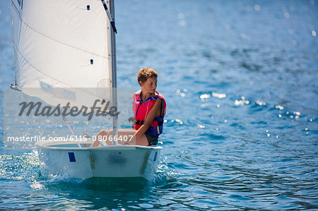 Boy in a sailboat, Hvar island, Croatia